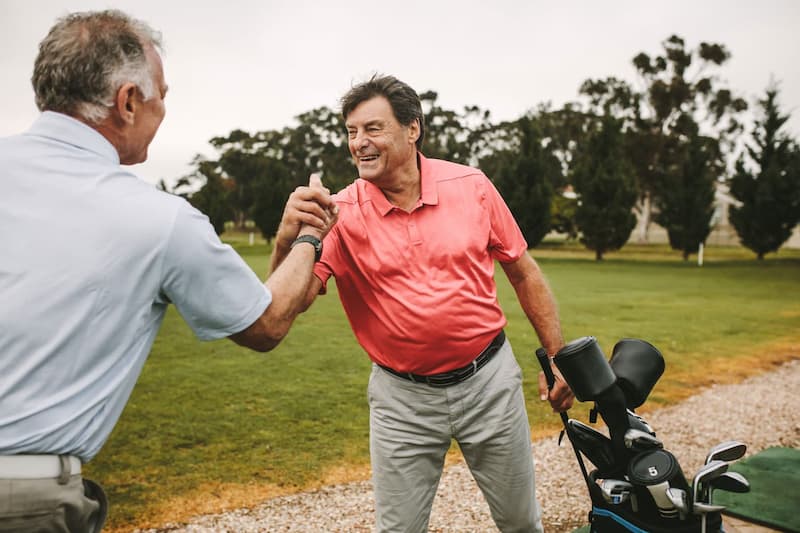 Executives celebrating hitting their marketing growth goals.